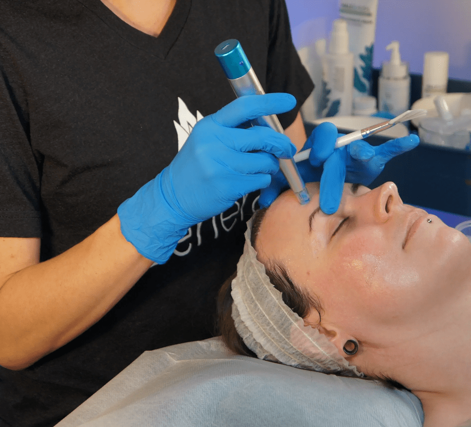 Esthetician performing facial procedure