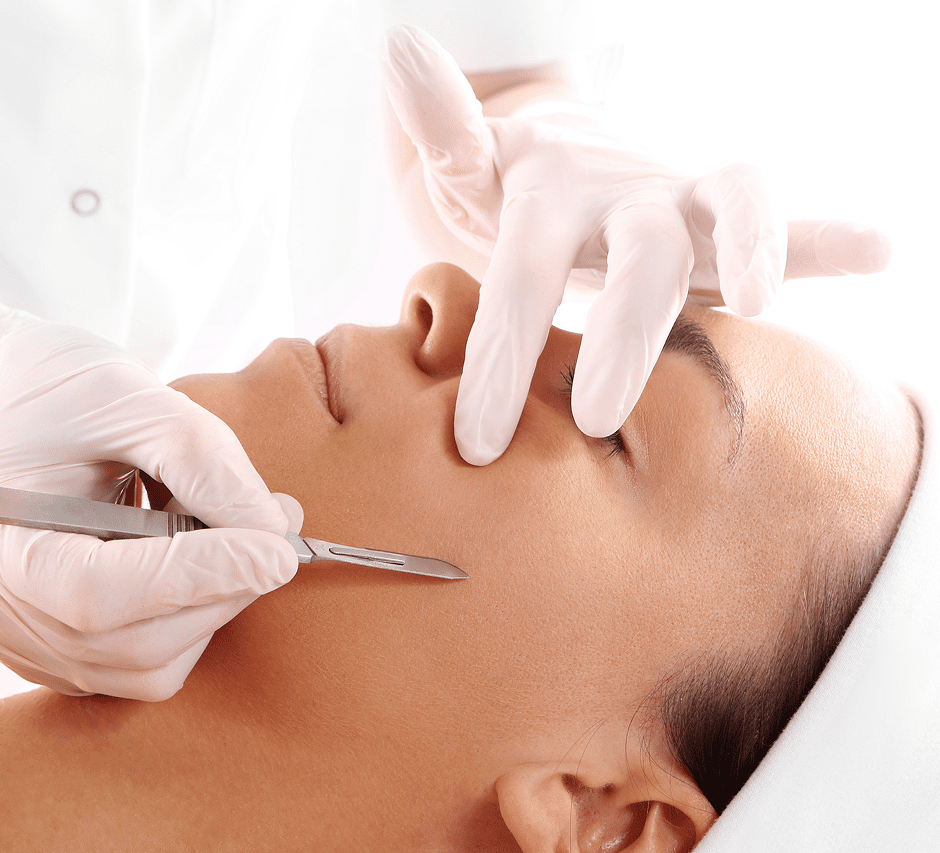 Skincare professional performing dermaplaning