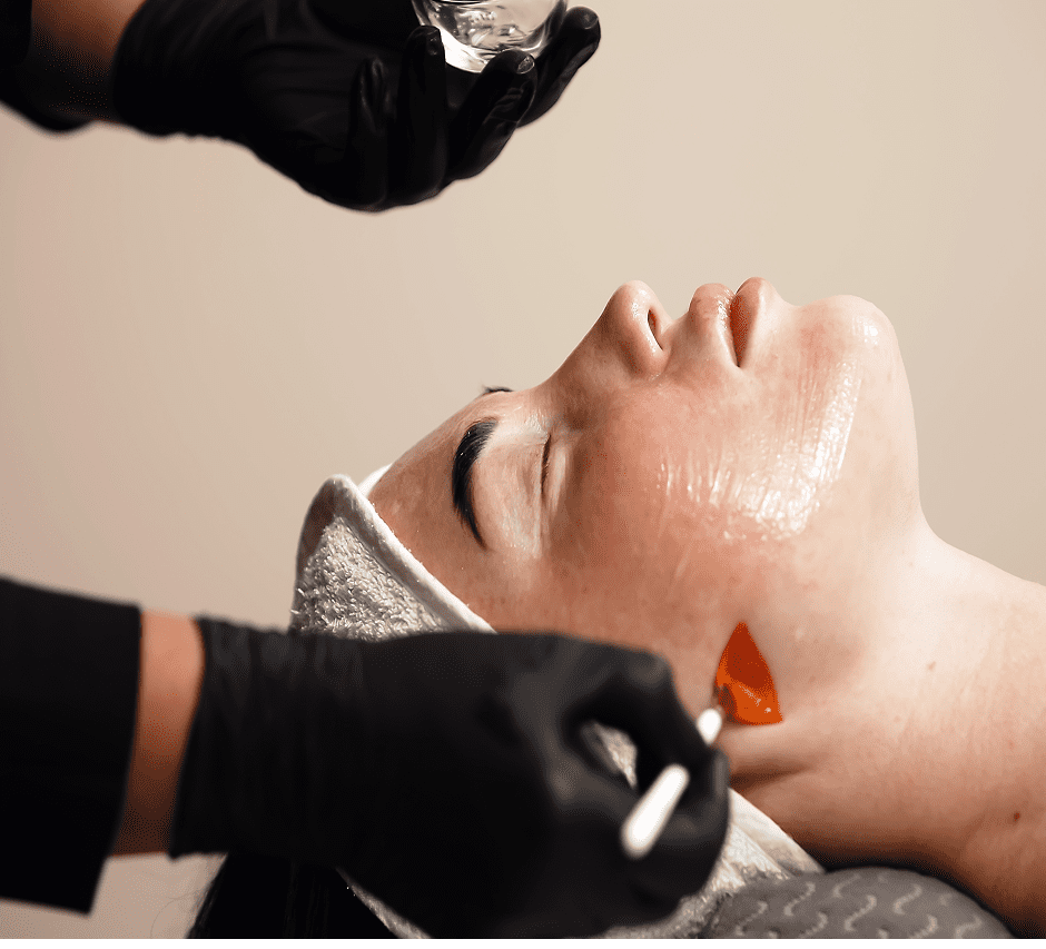 Woman receiving a facial mask
