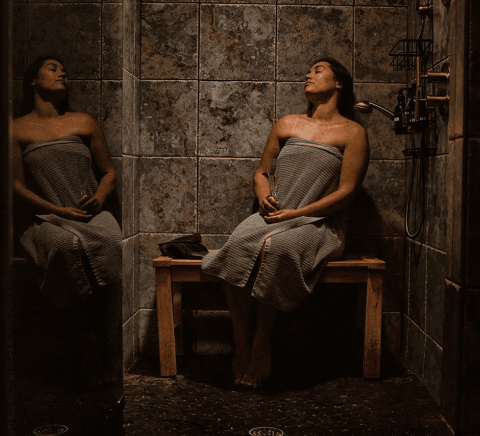 Reflective moment in a tiled shower