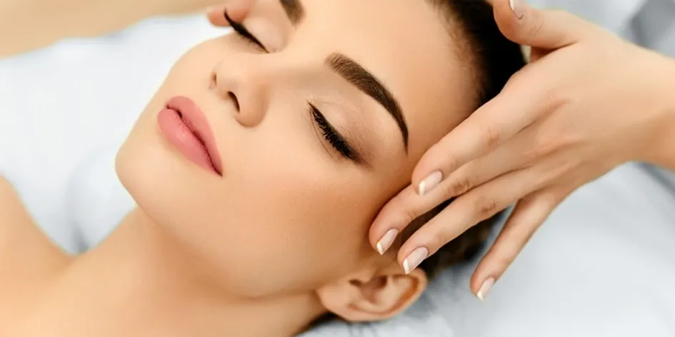 Spa treatment with gentle facial massage using hands
